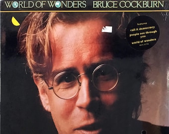 Bruce Cockburn, "World of Wonders" - Rare NEW, sealed copy of 1986 First Pressing - Includes "Call It Democracy", "People See Through You"