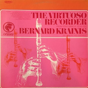 May include: A pink and white album cover with the title "The Virtuoso Recorder" and the artist "Bernard Krains". The cover features a drawing of hands playing a recorder.