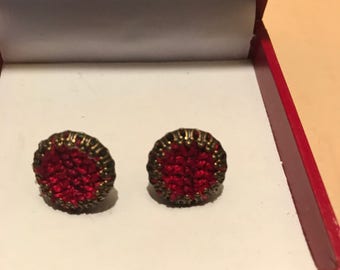 Cross stitch earrings.