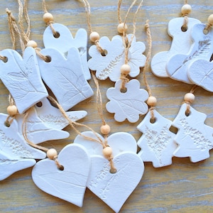 Botanical & lace embossed air dry clay ornaments in single pieces. Scandi style minimalist Christmas decorations. Textured gift wrap decor