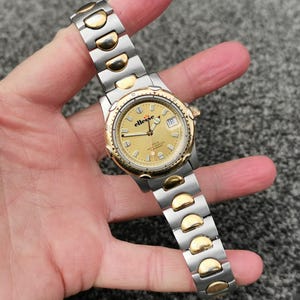 Vintage Ellesse Diver Watch Gold Steel 200m Date Luminous Hands Womens 1980s