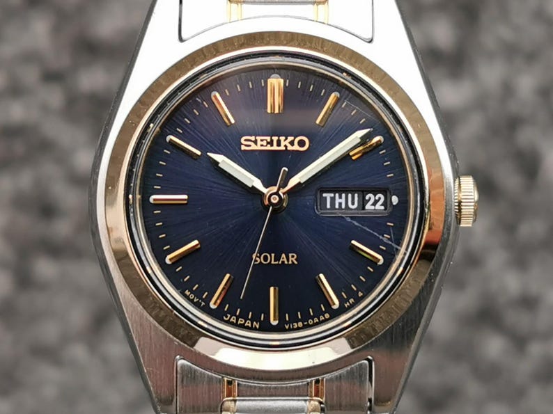Seiko SOLAR-klocka, blå urtavla, ljusgrå visare, E/F-dagarsdatum, rostfritt stålarmband bild 14