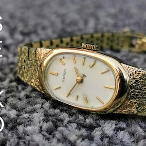 Seiko Uhr, Handaufzug, SGP Gelbvergoldetes Gehäuse, Armband, Vintage Schmuck 1976