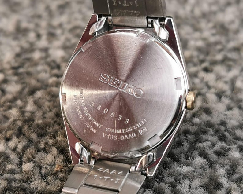 Seiko SOLAR-klocka, blå urtavla, ljusgrå visare, E/F-dagarsdatum, rostfritt stålarmband bild 8