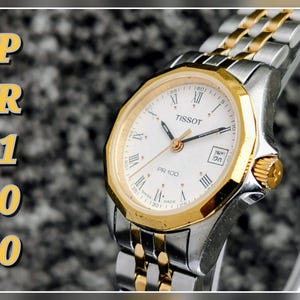Ladies Tissot PR100 Swiss Made Quartz Watch, Round Dial, Date, Two-Tone Gold Plated Stainless Steel Bracelet