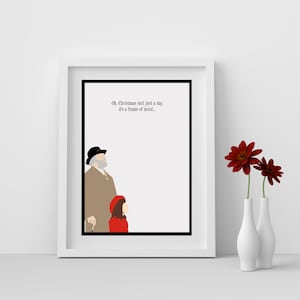 May include: A white framed print with a black and white illustration of a man and a girl. The quote "Oh, Christmas isn't just a day, it's a frame of mind..." is printed at the top of the print.
