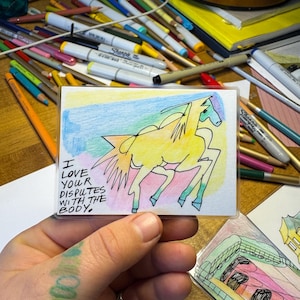 gebedskaart - regenboogpaard / geschillen; inkt en kleurpotlood: 2025