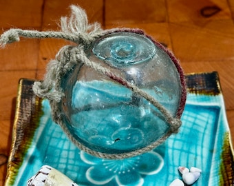 Vintage Sea Glass Float - with Fish Net Rope still attached - Found on the Island of Oahu - Measures 2 1/2" dia. - Some cool air bubbles too