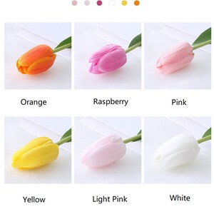 May include: Six artificial tulip flowers in different colors: orange, raspberry, pink, yellow, light pink, and white. The tulips are arranged in two rows of three, with each tulip displayed on a white surface.