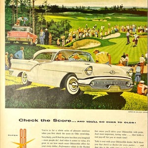 May include: Vintage advertisement featuring a white Oldsmobile Super 88 Holiday Sedan parked on a golf course. The image includes text that reads "Check the Score... AND YOU'LL GO OVER TO OLDS!" and "OLDSMOBILE".