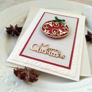 Feliz tarjeta de felicitación de Navidad con red Holly Berries Ornament