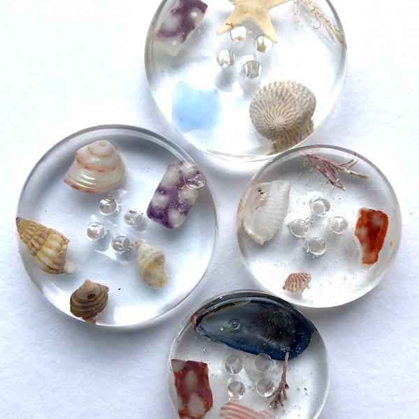 Stunning handmade buttons, shells, sea glass from the Shetland lslands set into resin. by Shetland artist Sarah Kay art. Feature buttons