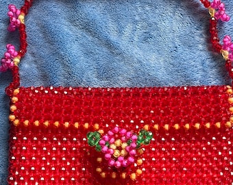 Beaded Floral Handbag.