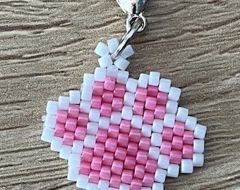 Brick Stitch White Trimmed Paw Print Charm.
