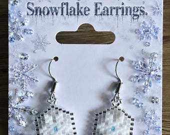Brick stitch beaded snowflake earrings.