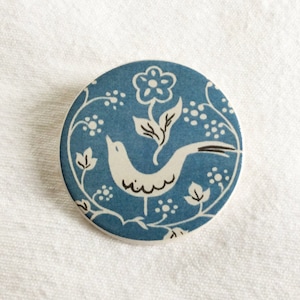 Round, handmade, ceramic, Blue Bird Brooch. From a design found in The Warner Textile Archive. A lovely gift for any occasion