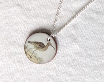 Ceramic, handmade, pendant necklace, vintage bird design 22mm diameter (approx 3/4 inch) Lovely Curlew necklace on silver plated 18” chain.