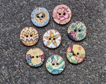 8 Assorted small 18mm(5/8in) handmade, washable, lightweight ceramic buttons featuring beautiful floral designs from Warner Textile Archive.