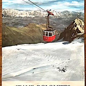 May include: A vintage travel poster advertising skiing in the Italian Dolomites. The poster features a red cable car ascending a snowy mountain with a view of the mountain range in the background. The text on the poster reads "ITALIE DOLOMITES MARMOLADA TOUJOURS SKI".
