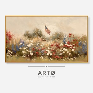 May include: A framed painting depicts a field of wildflowers in red, white, and blue, with an American flag waving in the background. The artwork has a gold frame and the text "ARTØ VINTAGE FRAME TV ART" at the bottom.