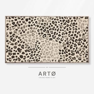 May include: A rectangular framed artwork with a leopard print design in brown and grey tones. The artwork is set against a light beige backdrop. The text "ARTØ VINTAGE FRAME TV ART" is displayed at the bottom of the image.
