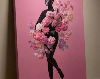 May include: A canvas print featuring a black silhouette of a person adorned with pink and cream-colored flowers against a pink backdrop. The artwork has a modern, artistic aesthetic, with the subject in a graceful pose. The canvas is mounted on a wooden frame.
