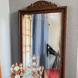Antique Louis Philippe Mirror, French Victorian Era hand carved and ornated, beveled. Walnut and gilt tones. 36.5x26.5&quot; Lots of foxing.
