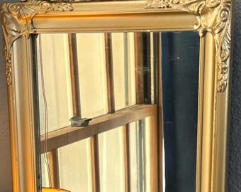 Antique French Baroque wood mirror. Old gold tone with ornate composite. 24.5 Long x 12"wide. See description.
