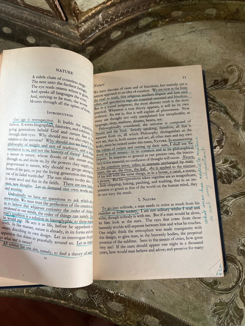 May include: A page from a vintage book titled "Nature" with a yellowed, cream-colored background. The text discusses the concept of nature and its relationship to humanity. The text is in black font and the page number "11" is in the top right corner.
