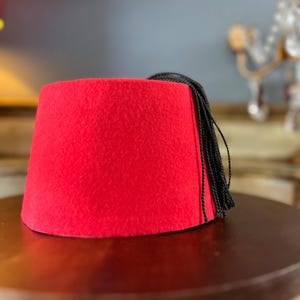 Vintage, authentic Fez Moroccan hat, felt with tassel. 4.5&quot; tall x 7.25&quot; diameter at the bottom.