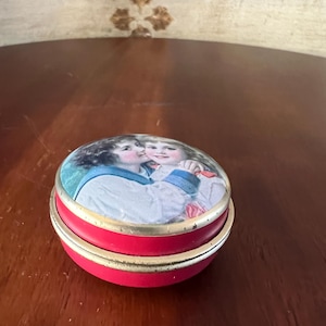 Vintage Bon Bon tin lidden  trinket, pill box. Compartment for 3 pills. 1.5 inches diameter x .5&quot; tall.