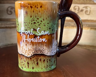 Houston Souvenir Stoneware mug with spoon. Glazed Pottery. 5"height x 3" wide 12oz