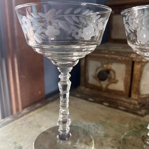 Midcentury modern Halifax by Rock Sharpe Sherbet or champagne glasses. Flowered Etched glasses.  6&quot; tall x 3.75 inches wide. 4oz. Set of 2.