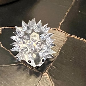 Swarovski Hedgehog silver crystal Figurine. Austrian Crystal Retired. Pristine condition. Approximately 1&quot; tall 1 inch wide. Collectible.