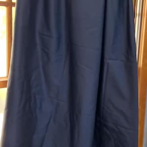Williams Sonoma navy blue large, rectangular tablecloth. 100% cotton. 124x70 inches. Excellent condition.