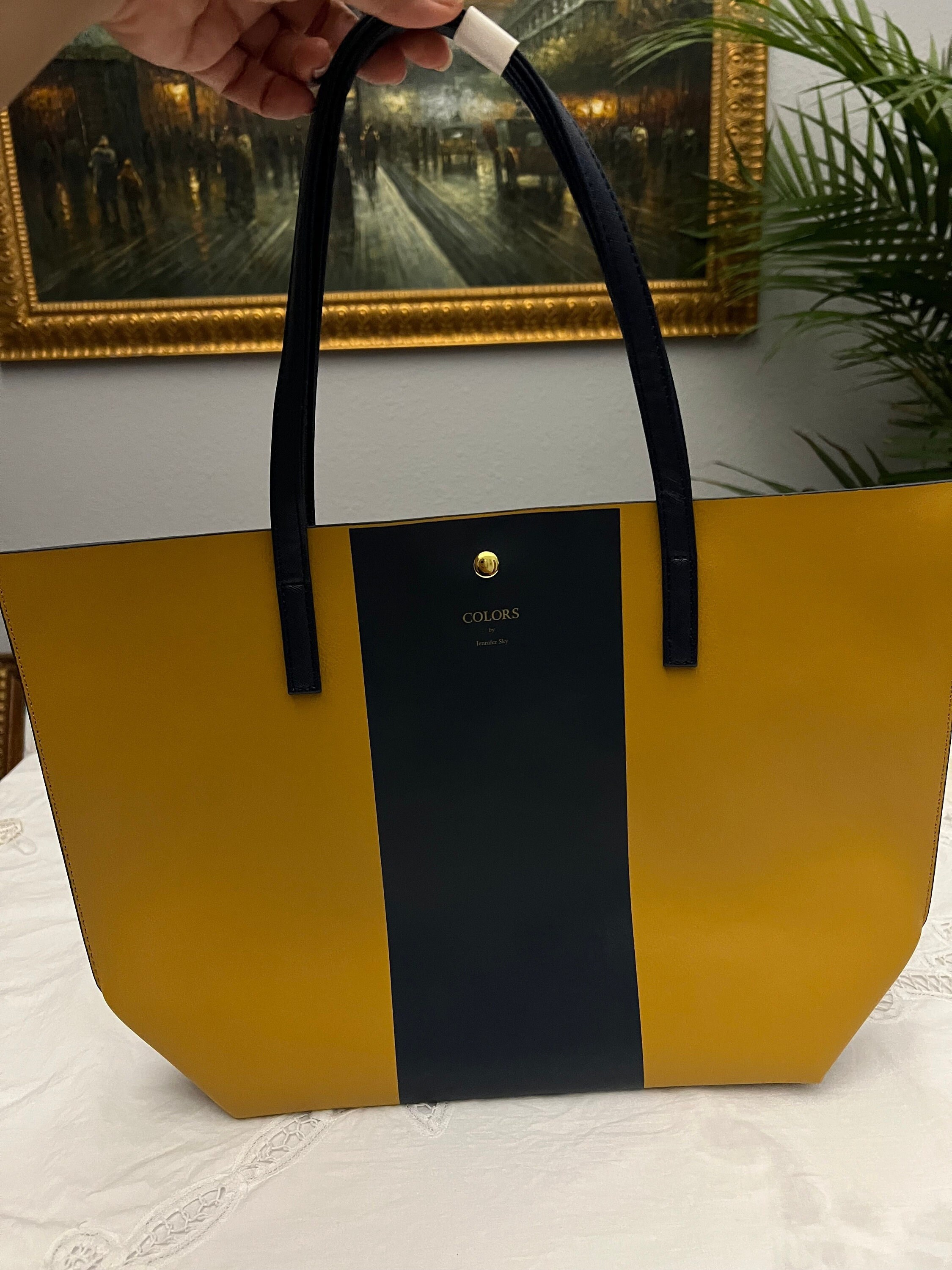 Brand new tote bag. Colors  By Jennifer Sky tote bag. 10x8". New with tags.