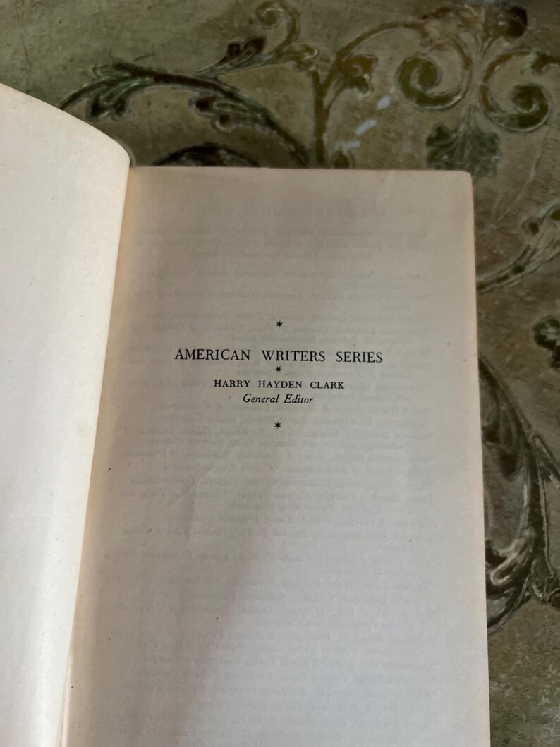May include: A book cover with the text "American Writers Series" and "Harry Hayden Clark General Editor".