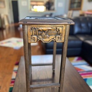 Beautiful Antique, Asian wood carved side table.20 inches tall by 12 inches wide. Excellent condition.