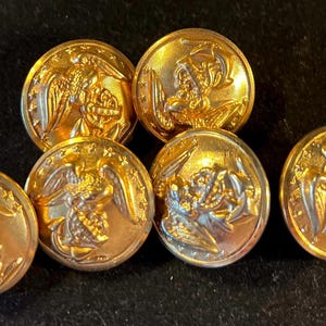 Vintage Waterbury brass military, Marine Corps button design of  Eagle anchor and stars. 1&quot; diameter x 1&quot; tall. Priced individually.