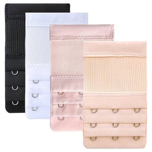May include: Four bra extenders in black, white, pink, and beige. Each extender has three hook-and-eye closures and is made of a soft, breathable fabric. The extenders are designed to add extra length to a bra band.