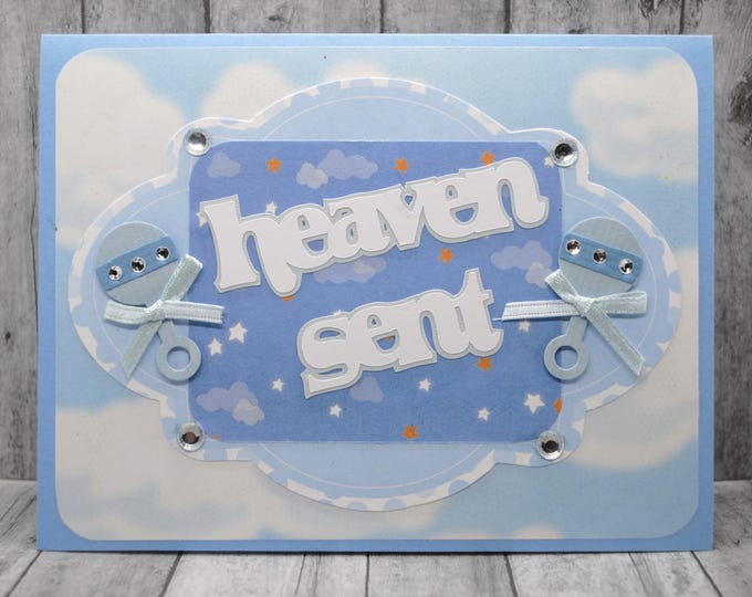 Heaven Sent Baby Card: Blue Clouds, Rattles