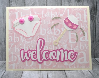 Welcome Baby Card: Pink Diaper and Rattle