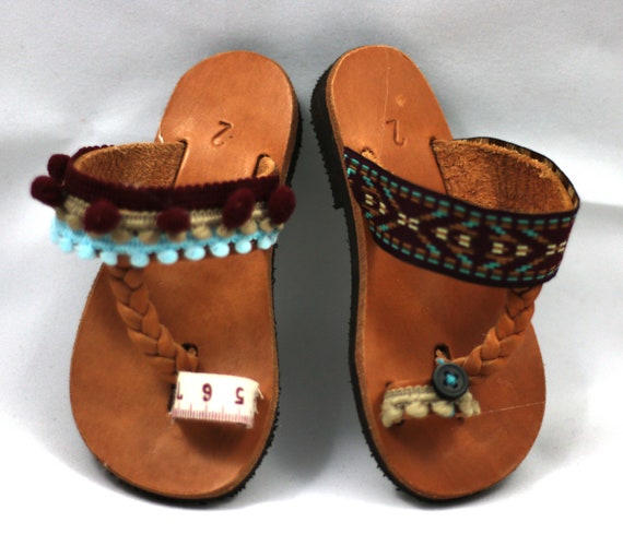 flip flops with pom poms