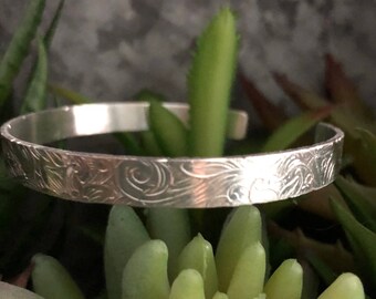 Bright and Shiny Silver toned Floral Paisley Cuff Bracelet