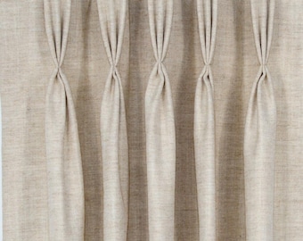 May include: A set of beige linen curtains with a triple pleat design, hanging from a gold rod.