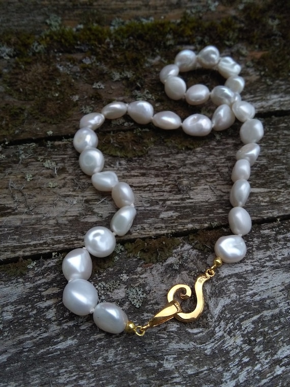 White Cultured Freshwater Pearl Necklace with 10mm Pearls Individually Knotted Sterling Silver White Cultured Freshwater Pearl Necklace with 10mm Pearls Individually Knotted Sterling Silver
