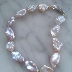 Baroque petal pearls on a silk cord, keshi freshwater pearl bracelet with sterling silver clasp
