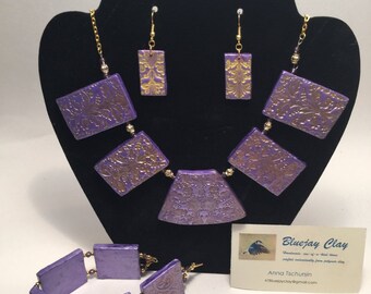 purple embossed statement jewelry set necklace, earrings, bracelet