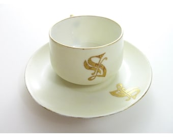 Taza y platillo de té vintage blanco dorado con inicial S o G, águila, porcelana austriaca.