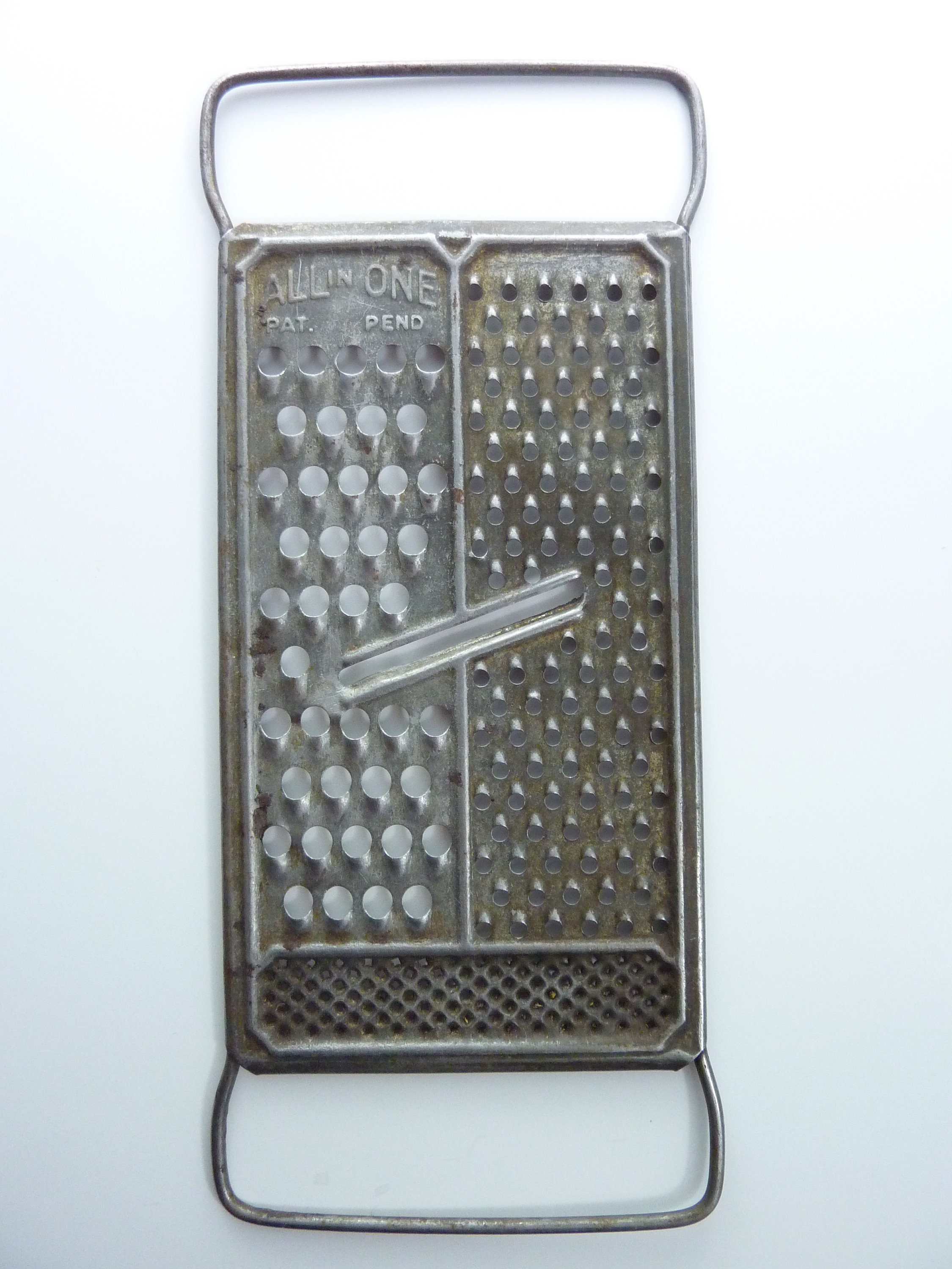 5-Minute DIY: Turn a Cheese Grater Into an Earring Caddy - Brit + Co